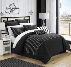 Charming patterns and fresh white accents adorn a solid grey base bedroom. 22 Best Black Bedroom Ideas And Designs For 2021