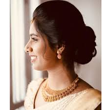 Bride : Anju James MUA : Maya's beauty clinic Kottayam Wedding saree:  Seematti Cochin Photography: White hopper wedding photography Jewellery: GJ  Jewellers . . . . . . . . To get