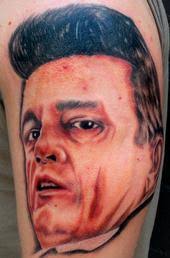 AngieOverkill Can the design be Alan Belcher's Johnny Cash tattoo?