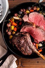 Prime rib is expensive, but just like most things, it's much cheaper to serve at a dinner party at your house then to buy for serve with horseradish, if desired. Standing Rib Roast Recipe Prime Rib Recipe The Mom 100 Recipe Prime Rib Recipe Rib Recipes Standing Rib Roast