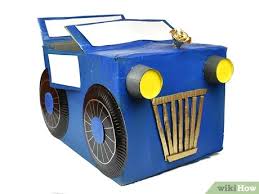 Cut slits at the center of your card. How To Make A Cardboard Car Wikihow