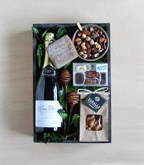 A Lovely Bottle Of Champagne Accompanied By Hand Picked Treats Sparkling Crate By Winston Flowers Wine Gift Boxes Champaign Gift Gourmet Gift Baskets