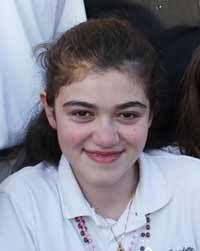 Teen's Wheelchair, Spirits Lifted in Bath Beach