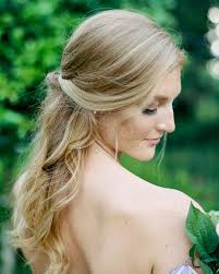 You can tie a loose top knot with the ends hanging out and then. Half Up Half Down Wedding Hairstyles We Love Martha Stewart