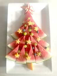 I layered the fruit, meaning i put the various fruits on the tray and then went back and added more of each fruit of top, creating 2 layers. Make An Easy Christmas Tree Fruit Platter The Plumbette