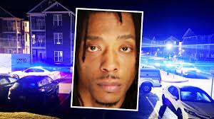 New charges against man accused of firing gun as cops cuffed him