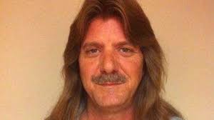 Apollo Beach man readies to donate 16-inch mane to Locks of Love