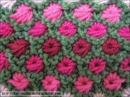 Aster Flower Knitting Stitch Is Created In An Unusual Way To Make Flowers Within A Garter Stitch B Knitting Stitches Knit Stitch Patterns Multi Colored Flowers