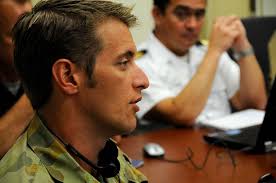 Australian Army Maj. Benjamin Watson, the assistant