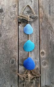 Maybe you would like to learn more about one of these? Seashell Hanging Decor Driftwood Cobalt Blue By Beachbungalowinc 24 00 Nautical Beach House Decor Beach W Seashell Projects Sea Shell Decor Seashell Crafts