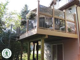 this calgary high deck was built in 2009 and is located in the community of marda loop the de privacy screen outdoor backyard entertaining area backyard patio