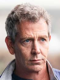 The Night Sitter Trailer Teases a Colorful, Creepy Horror Movie