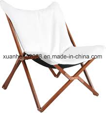 Keep off the sand or mud and relax with a folding beach chair. China Outdoor Wood Folding Chair Wooden Canvas Beach Chair Lounge Chair Photos Pictures Made In China Com