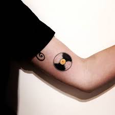 Edwards's board phonograph tattoos on pinterest. 15 Awesome Music Tattoo Design Ideas Top Beauty Magazines