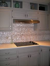 Pin By Ellie Taylor On Showers And Baths Mother Of Pearl Backsplash Pearl Backsplash Backsplash For White Cabinets