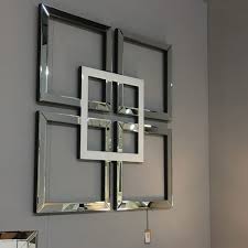 • made of metal with a handpainted gold finish. White Silver Mirrored Geo Mirror Wall Art All Home Living