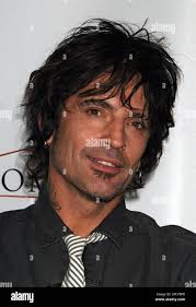 FILE**Rocker Tommy Lee poses inside a nightclub, Aug. 15, 2005, in New  York. A pilot faced reckless flying and other charges for landing a  helicopter