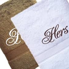 £5 per plain bath towel in 70 by 130 cm size. His And Hers Towels Personalised Brown White Bath Towel Set