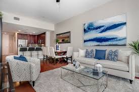 Use nesting tables as end tables, since they can be placed around a room for casual meals. How To Make Small Spaces Look Bigger With Staging