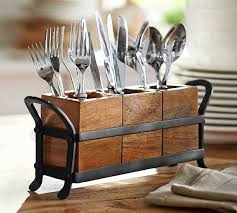 Maybe you would like to learn more about one of these? Vintage Blacksmith Metal Flatware Caddy Pottery Barn