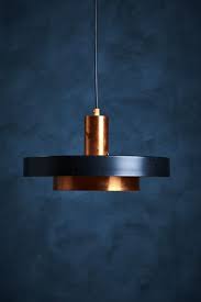 Many modern light fixtures are energy efficient, making your home improvement project easy on the eyes and the wallet. This Danish Copper Pendant Lamp With A Black Shade Would Be A Nice Addition To Any Modern Environment Copper Pendant Lights Copper Lighting Copper Lamps
