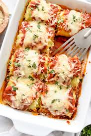 Chicken thighs poach until tender in stock, which becomes the base for a creamy béchamel sauce. Vegetarian Spinach Lasagna Roll Ups Foodiecrush Com