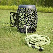 From plastic to terracotta, from big to small, we've got a huge collection online and in store. Sunjoy Decorative Steel Hose Pot Reviews Wayfair Garden Hose Holder Hose Holder Garden Hose Storage