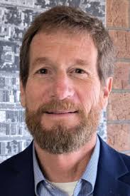 City quietly sought $8.45 million pedestrian bridge while GJ Auto Sales  fought acquisition