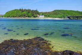 Escape to enjoy miles of sandy beach and traditional live music. The White Sands Of Morar Beside Mallaig I Wish I Owned This Cottage