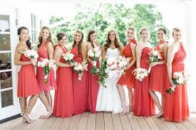 Bridesmaids Wearing Dresses In Papaya From Little Borrowed Dress Rentable Bridesmaids Mismatched Coral Bridesmaid Dresses Bridesmaid Papaya Bridesmaid Dresses