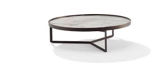 In most rooms, leaving 16 to 18 inches between the edge of the couch and the table leaves plenty of leg room, but is still close enough to easily reach for a drink. Nebra Coffee Side Tables Products Draenert