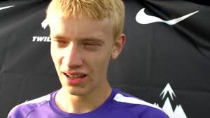 Michael Slagowski won the featured boys mile race at the 2015 Nike Jesuit  Twilight Relays