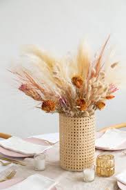 Diy Cane Wrapped Vase With Dried Floral Arrangement Alice And Lois In 2020 Dried Floral Diy Vase Floral Arrangements Diy