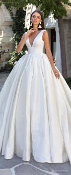 It's cut in a classic silhouette and features a scoop neckline with wide straps which extend into a square back. Simple Wedding Dress By Eva Lendel Wedding Dresses Simple Wedding Dresses Best Wedding Dresses