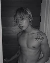 Korean culture still frowns upon tattoos, but idols are technically . E Dawn E Dawn Pentagon Hyuna And Edawn Geometric Tattoo