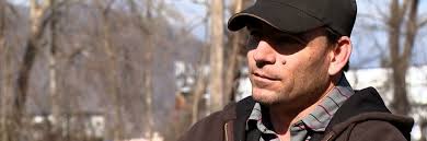 Son defends mother charged in a murder-for-hire case