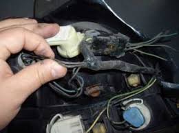 By law, trailer lighting must be connected into the tow vehicle's wiring system to provide trailer running lights, turn signals and brake lights. Connecting The Wiring To The Brake Lights Howstuffworks