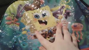 A page for describing heartwarming: The Spongebob Movie Sponge On The Run Camp Coral Backpack Set Review Youtube