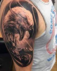 Top 50 Tattoos With Meanings Eagle Tattoo Lizard Tattoo Tattoos Bull Tattoos
