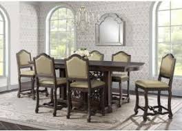 To create ambiance for any occasion, remember to accessorize the high dining table. Chesley Counter Height 7pc Dining Room Set The Furniture Shop Duncanville Tx