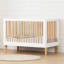 The curves, moldings, and panel effect on this attractive crib will add an elegant touch to the nursery. South Shore Balka Baby Crib With Adjustable Height Pure White And Exotic Light Wood Walmart Com Walmart Com