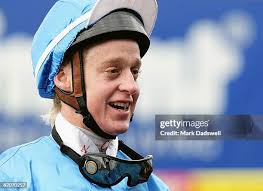 Jockey Sam Hyland riding Bolle gets his nose in front