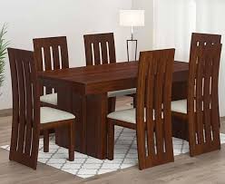 It comes in a black and grey finish and features fully upholstered back with cut out pattern and tubular metal legs. Dining Table Buy Dining Table Set Online From Rs 6990 Flipkart Com