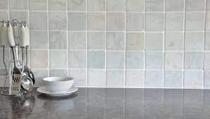 Dark grey veins and thick patterns of richness often characterize calacatta marble, and it is often paired in a kitchen with stainless steel or metal appliances. Tumbled Marble White Stokes Tiles