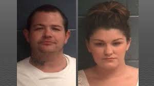 Couple wanted in shooting of newlyweds in custody