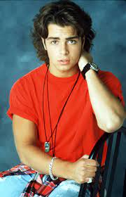 Punk hairstyle for curly hair. The Trendiest Hairstyle For Men The Year You Were Born