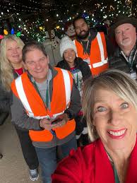 Giving a Hoot volunteers at Christmas Storybook Land