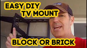 To install a tv bracket on a brick wall. How To Mount Tv To Block Or Brick 2021 Youtube