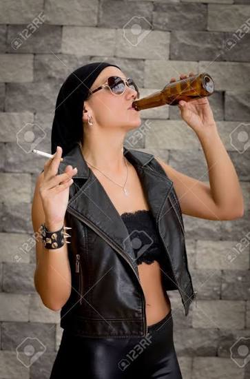 Woman Having A Beer Drink And A Smoke Stock Photo, Picture and Royalty Free Image. Image 18986190.
