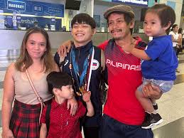 ABS-CBN News - Champion gymnast Carlos Yulo arrived in the Philippines and  was welcomed by his family late Tuesday after winning 3 gold medals in the  FIG Artistic Gymnastics World Cup Series